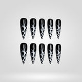 Steel Smoke smoke marble cat eye press-on nails in a stiletto shape - marble, chrome design