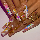 Neon Burst press-on nails — vibrant geometric patterns on square nails