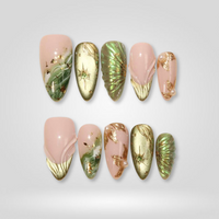 Dreamy Glow hand-painted press-on nails with sparkling Y2K designs on almond shape