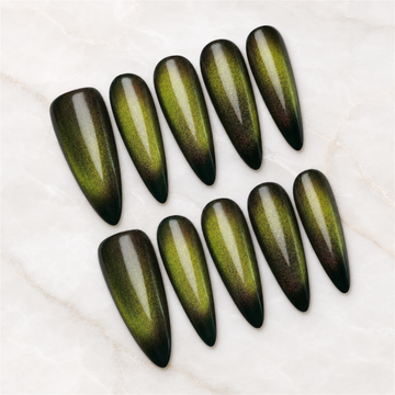 Olive Eclipse cat-eye press-on nails with magnetic glow