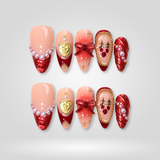 Pearl Wish Christmas press-on nails, red and gold festive design