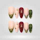 Golden Eve press-on nails — red and green holiday design