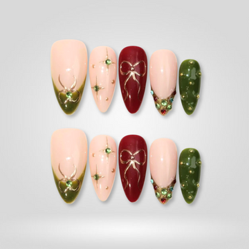 Golden Eve press-on nails — red and green holiday design