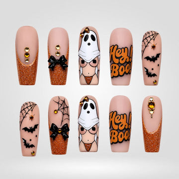 Hey Boo orange glitter ghost press-on nails in almond shape