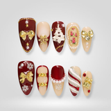 Glam Noel red and gold bow press-on nails for Christmas