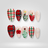 Plaid Fest Christmas press-on nails with red and green checkered pattern and tree accents