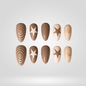 Taupe Stardust press-on nails with star swirl design