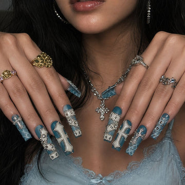 Azure Saint press-on nails — handmade icy blue with silver crosses and Y2K details on square shape
