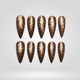 Golden Tiger gold tiger stripe cat eye press-on nails in a stiletto shape - tiger, chrome design