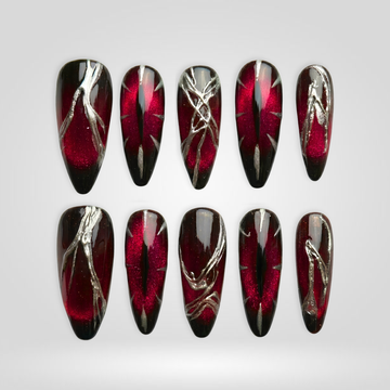 Crimson Blade seashell-inspired press-on nails with floral details
