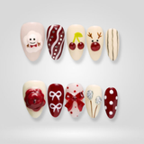 Merry Fun press-on nails — festive reindeer and cherry design