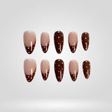 Mocha Tips press-on nails with nude base and brown French tips
