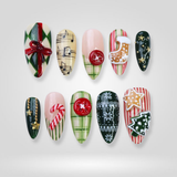 Joy Gift press-on nails — candy cane and gifts on oval nails