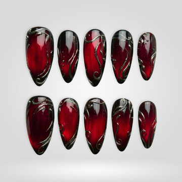 Ruby Vines cat-eye press-on nails with vine and floral design
