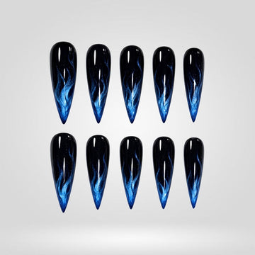 Midnight Blue Flame cat eye press-on nails — blue flames over jet-black stiletto tips