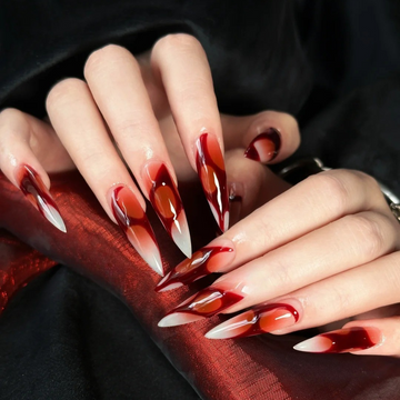 Crimson Veil press-on nails — dark red and black gothic design on stiletto