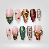 Star Luxe press-on nails with festive red and gold star design