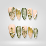 Olive Noel Christmas press-on nails with snowflake design