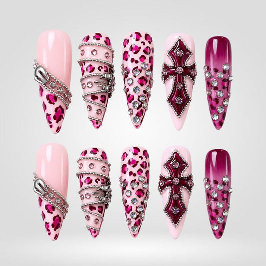 Pink Venom press-on nails with leopard print and rhinestones on stiletto shape