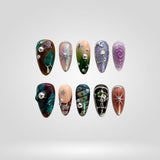 Mystic Veil press-on nails — jewel-toned with 3D artistic embellishments