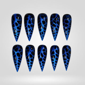 Cobalt Leopard cat eye press-on nails — electric cobalt with black leopard crackle on stiletto