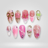 Pink Ribbon press-on nails with 3D floral and bow details