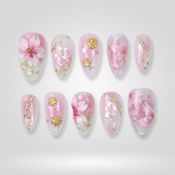 Cherry Petal nails with hand-painted sakura cherry blossom design