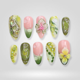 Spring Glow press-on nails with pastel florals