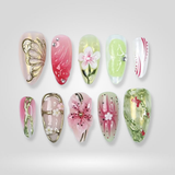 Blossom Charm press-on nails with hand-painted cherry blossoms