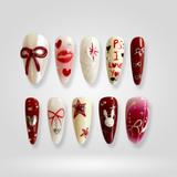 Ruby Bow Valentine press-on nails, featuring red bow and heart accent details