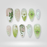 Petal Veil press-on nails with sheer pastel layers and hand-painted florals
