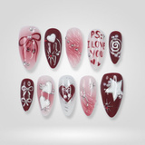 Pearl Love press-on nails with pearl embellishments and hearts