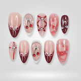 Rosy Spark Valentine press-on nails, featuring glitter sparkle and heart accents