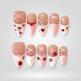 Sweet Ribbon Valentine press-on nails with heart and bow design
