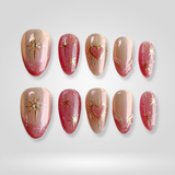 Pearl Kiss press-on nails, soft pink with pearl heart accents
