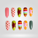 Retro Star hand-painted nails with bright polka dot pattern