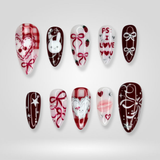 Bow Romance hand-painted Valentine press-on nails with delicate bow accents