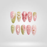 Blush Pearl press-on nails with pearl luster and floral details