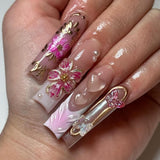 Blooming Elegance press-on nails — 3D pink floral sculptures with gold embossed accents