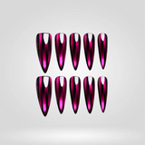 Berry Venom spider cat eye press-on nails in stiletto shape — magenta chrome with black spiders