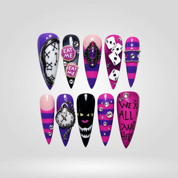 Skull Queen fantasy press-on nails with pink, purple stripes and playing card design