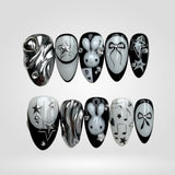 Silver Bunny Y2K press-on nails — silver bow and bunny design on almond