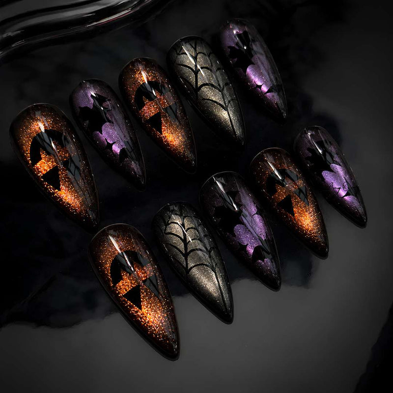 Amber Witch press-on nails — handmade cat eye with spiderweb and witch silhouette on stiletto shape