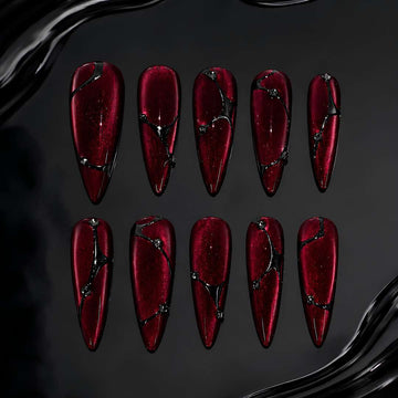 Red Velvet stiletto press-on nails with deep red cat-eye magnetic finish