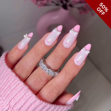 Soft Spring floral press-on nails with delicate petals
