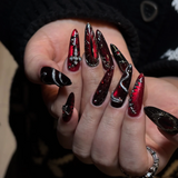 Wicked Kiss 3D press-on nails with bold red and black gothic design