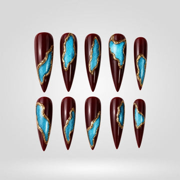 Ruby Marble stiletto press-on nails with marble pattern design