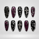 Violet Vow gothic press-on nails — silver crosses and beads on almond nails