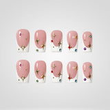 Crystal Gem 3D floral press-on nails in soft pink with gold accents