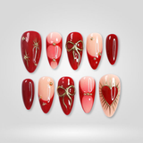 Sacred Love press-on nails, red hearts and gold bows
